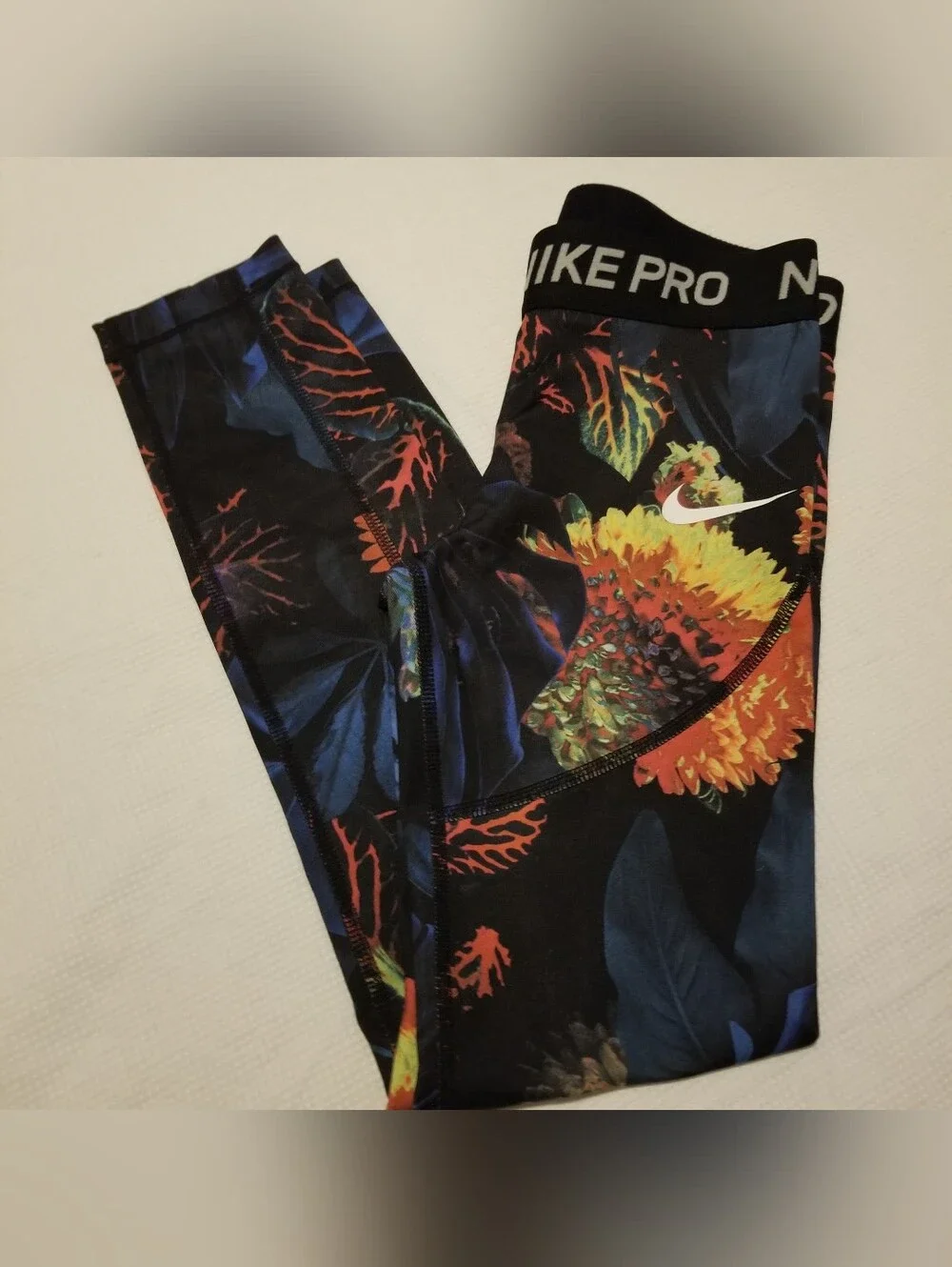 Nike Pro Girl's Small Black With Blue, Orange, & Yellow Floral Print Leggings